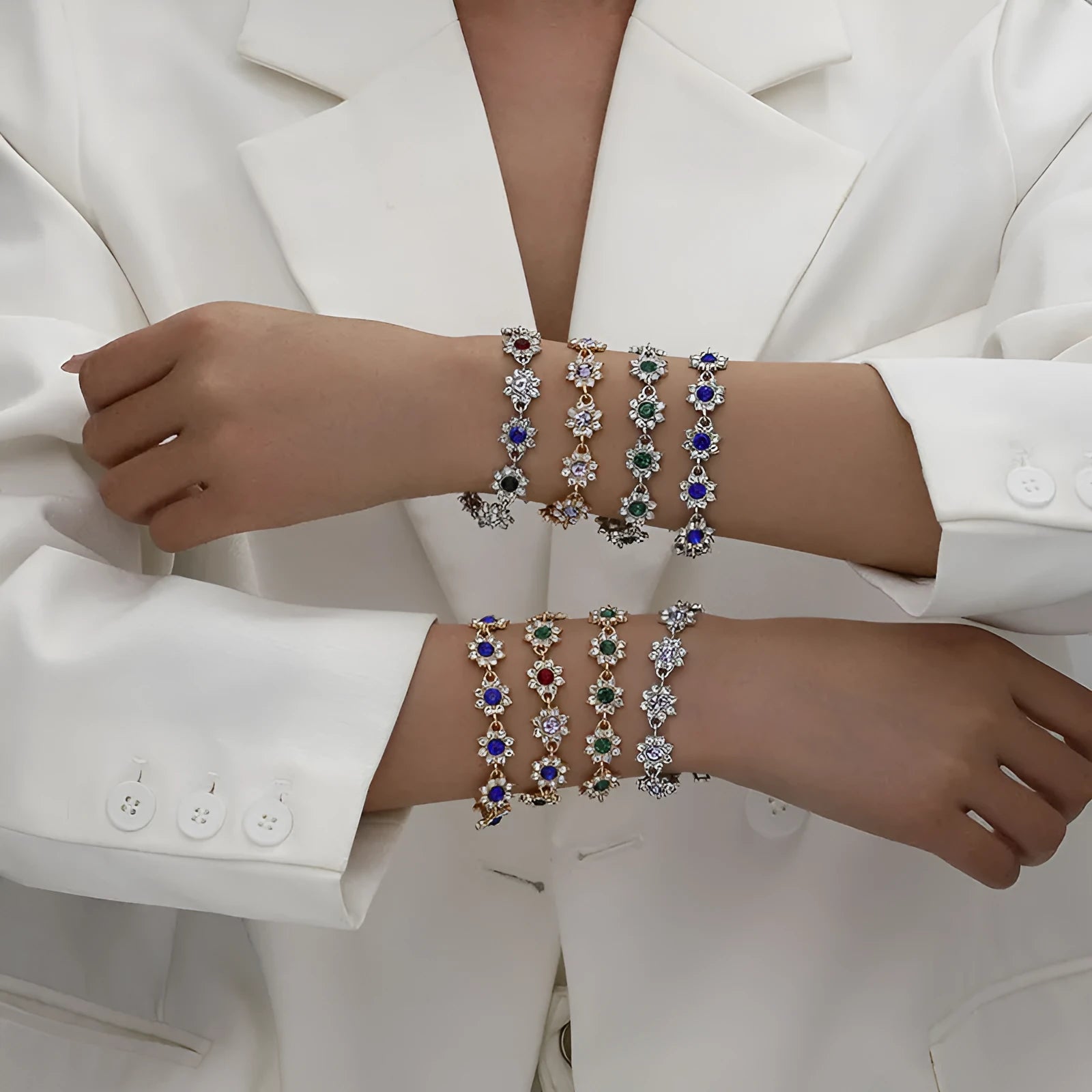 Flower design fashion bracelet in zinc alloy showing electroplated colour options with crystal and simulated diamond elements