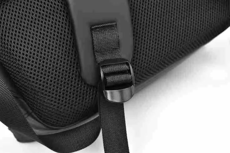 Large black waterproof backpack with 40 litre capacity and PU leather construction
