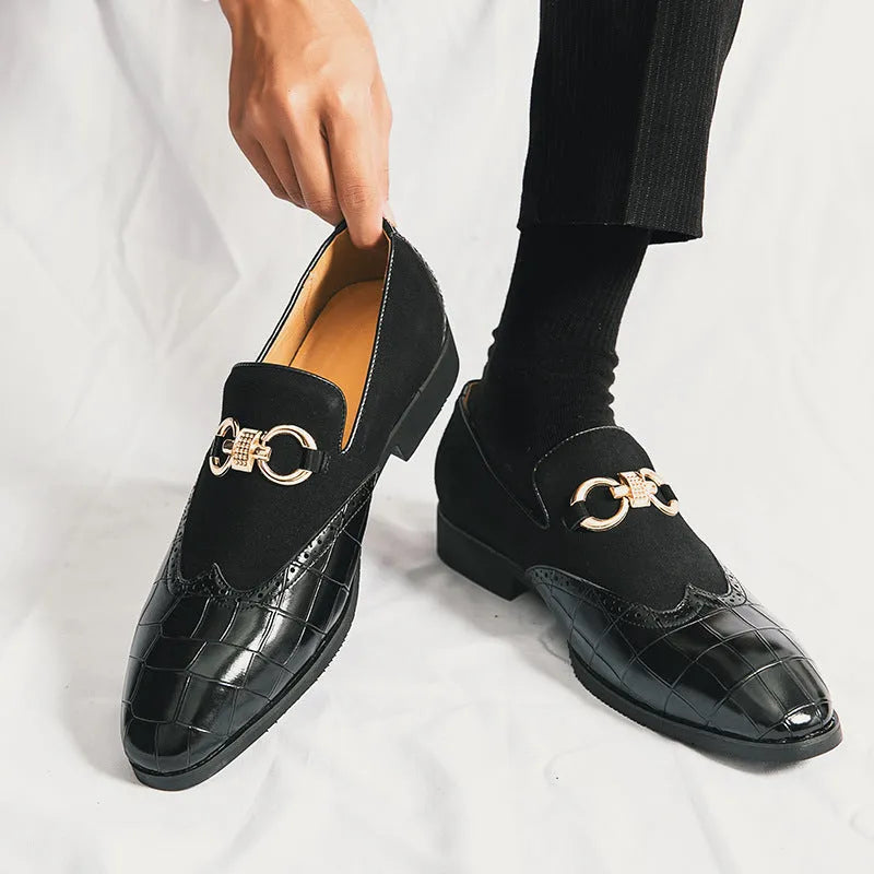 Men's black pointed toe low top casual shoes with a rubber sole and decorative stitching.