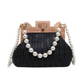 Women's straw woven shoulder bag with pearl chain detail showing interior organisation compartments
