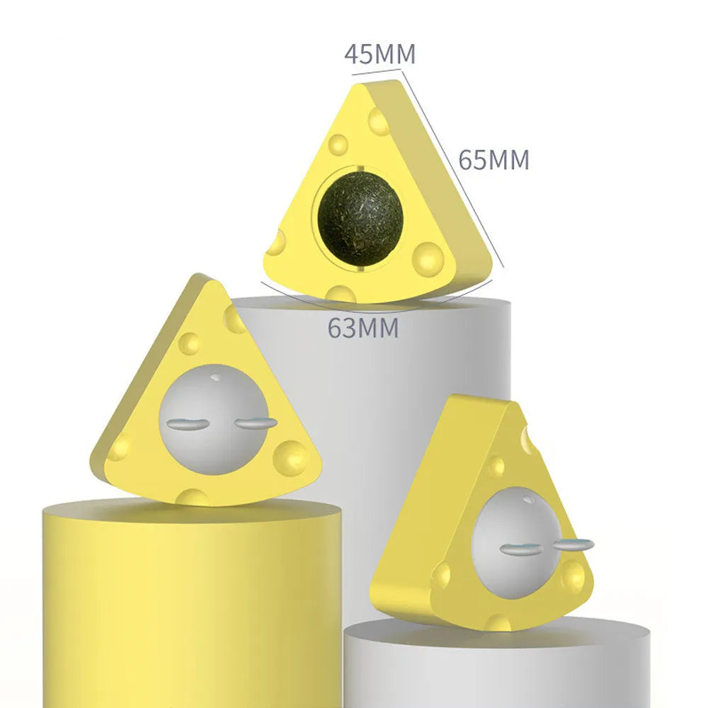 Yellow cheese-shaped cat toy ball with textured surface for teeth cleaning, filled with catnip and silvervine.