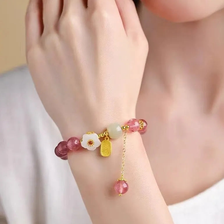 Handcrafted strawberry quartz crystal bracelet with green strawberry quartz moon charm for women