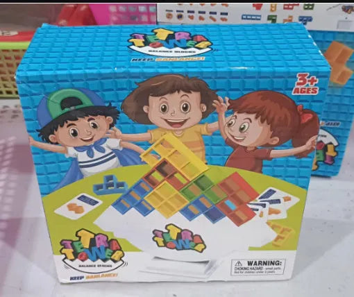 Balance stacking game with 16 plastic building blocks, chassis, and base on a table