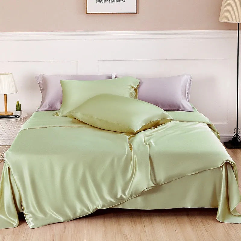 Double-sided silk duvet cover in a solid colour, shown in bright brown on a bed.