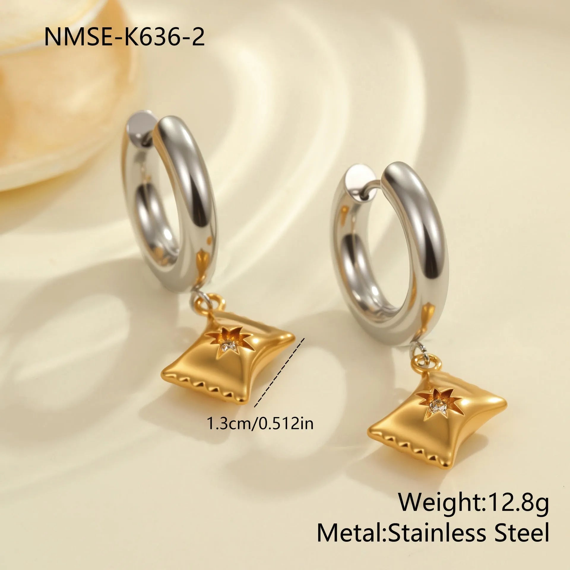 Christmas tree shaped stainless steel earrings with 18K gold electroplated finish and heart star geometric accents