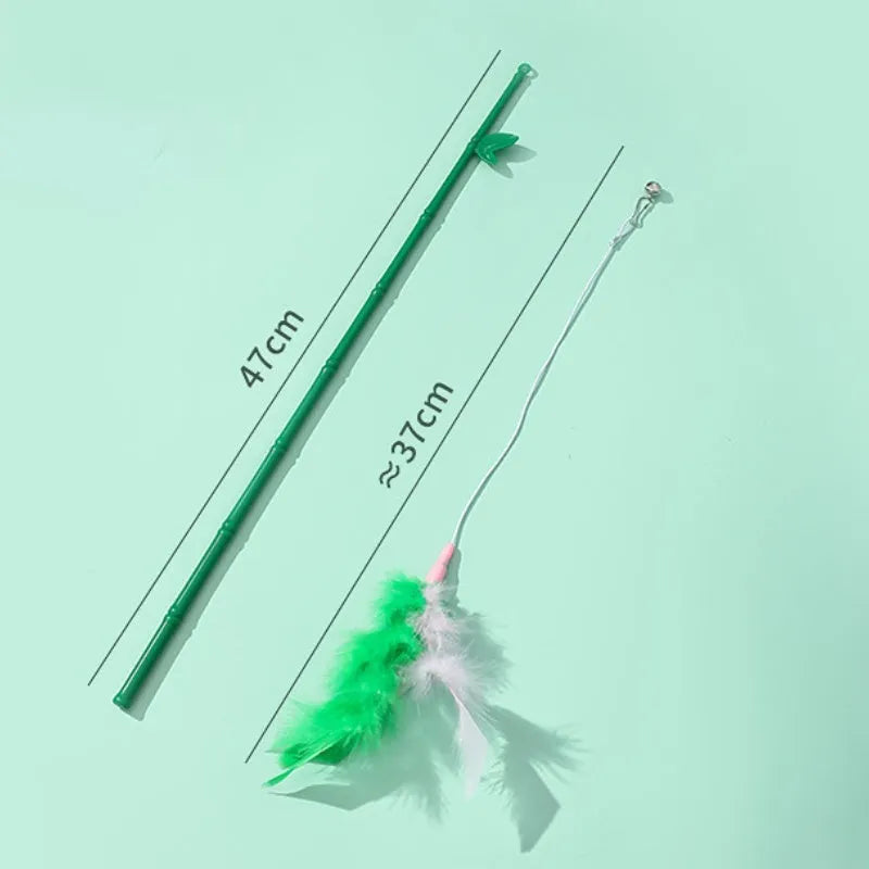 Green interactive cat feather wand toy with bells and feathers on a durable string