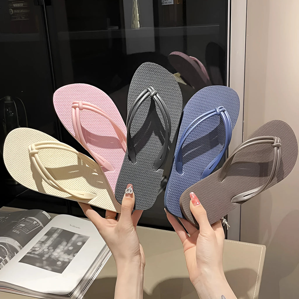 Men's PVC flip flops with toe cover design in multiple colour options showing injection moulded construction