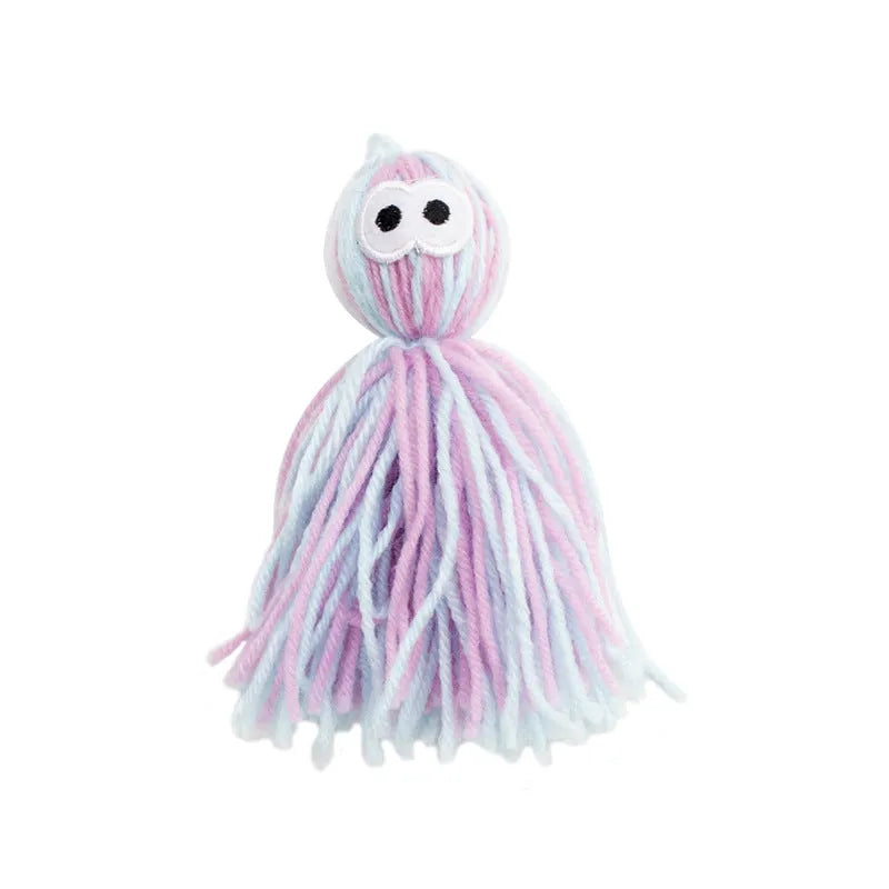 Wool cat toy ball with hanging string in blue grey, pink and blue, or pink purple colours for biting and scratching