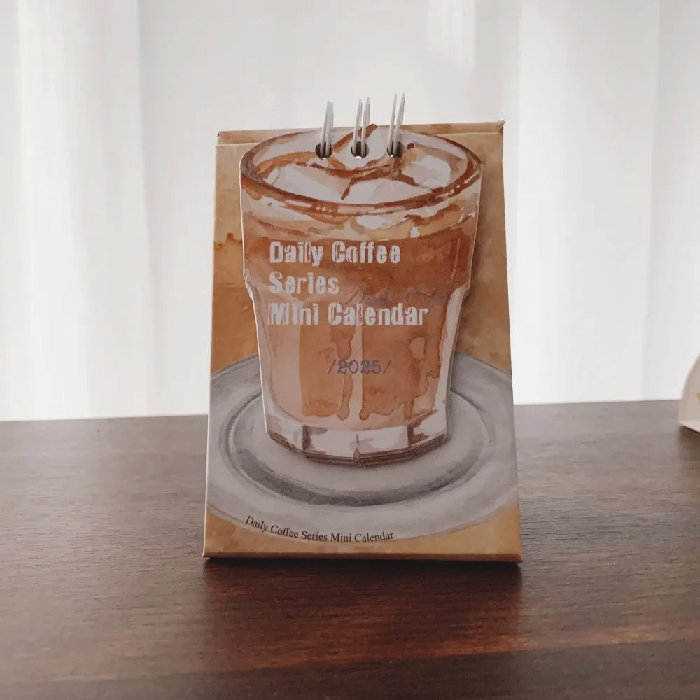 Coffee-themed 2025 mini desk calendar showing four simple modern design options
