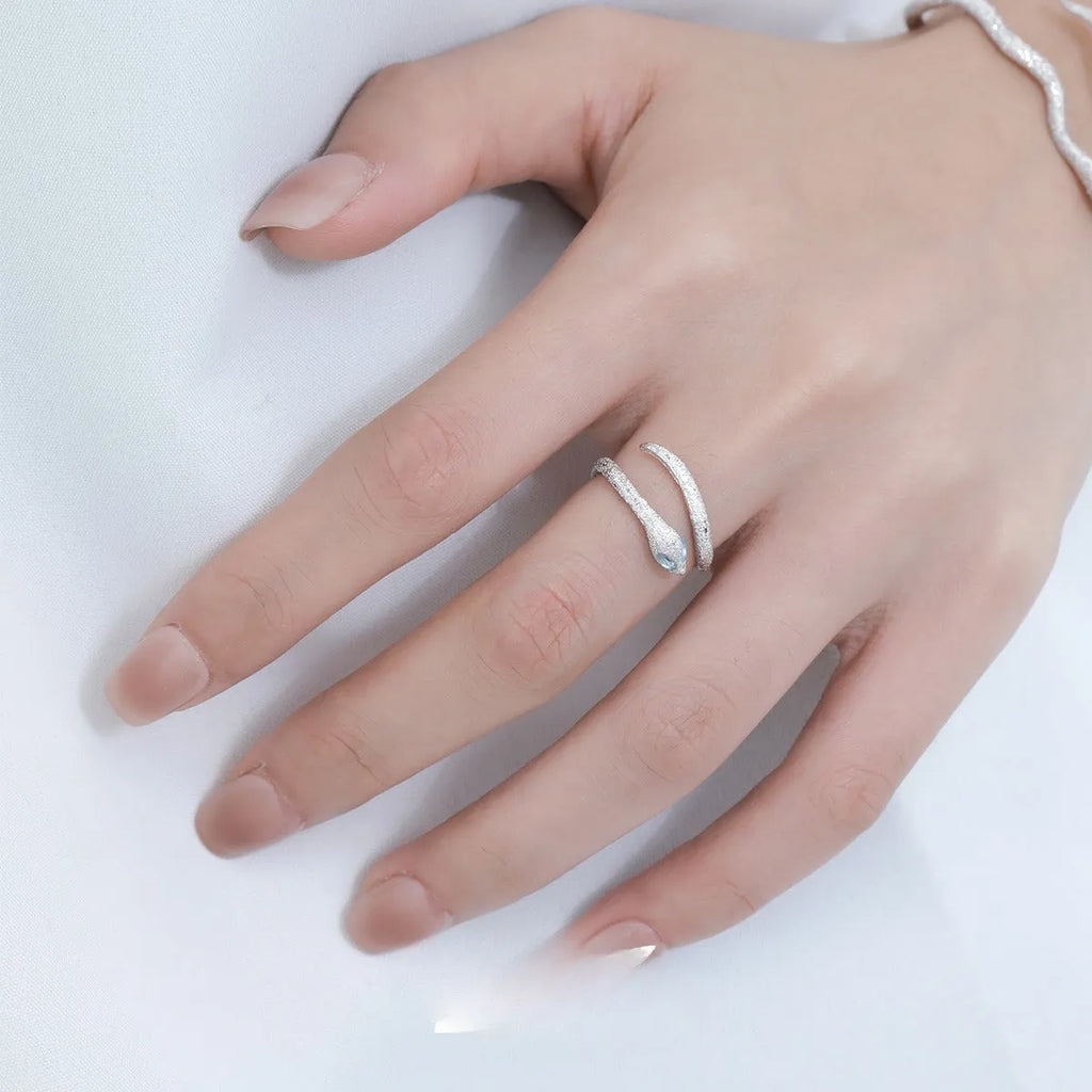Silver snake zodiac ring with adjustable opening in white gold colour