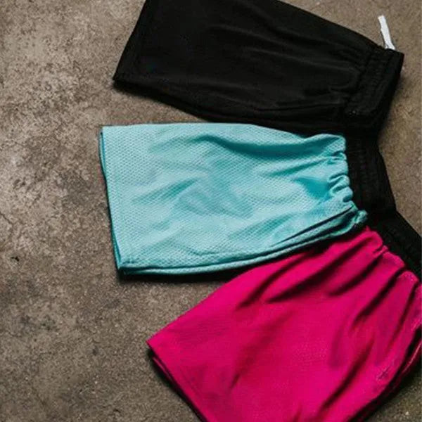 Men's solid colour mesh quick-drying shorts in black, shown flat.