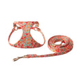 Floral patterned cloth dog harness and leash set in orange, purple, pink, black or white with red flowers design