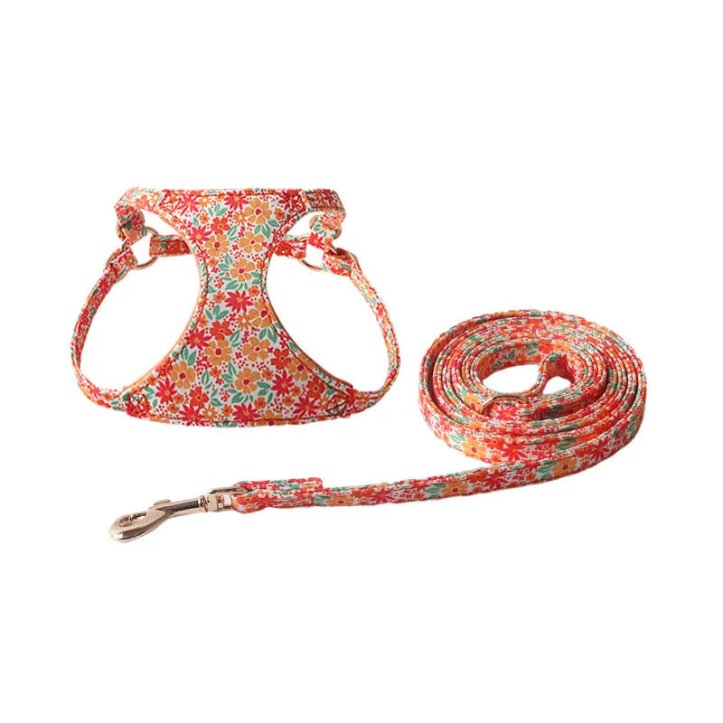 Floral patterned cloth dog harness and leash set in orange, purple, pink, black or white with red flowers design