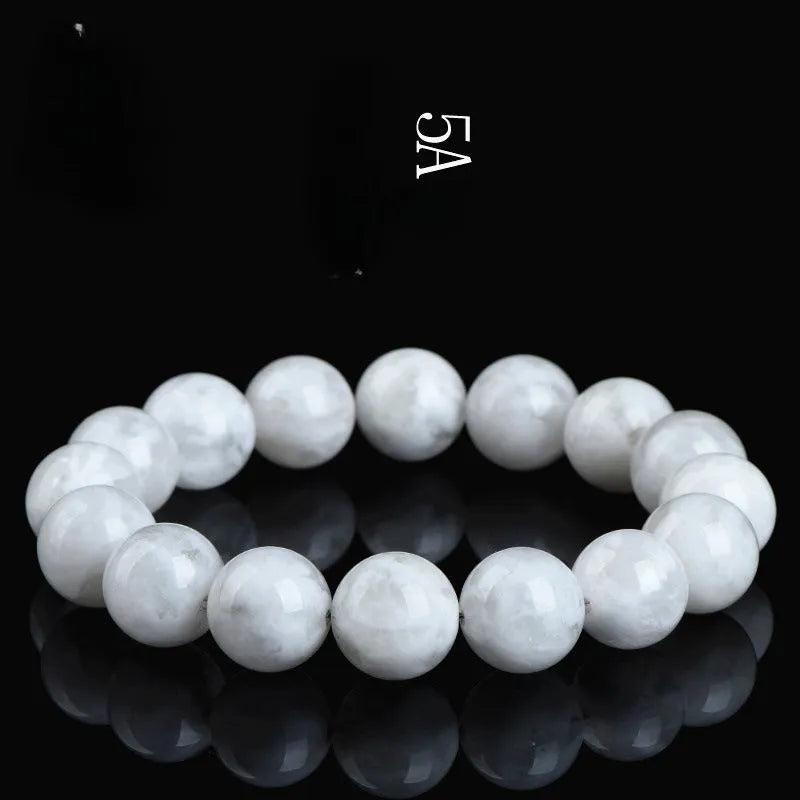 Crystal women's bracelet with natural blizzard snowflake round beads in geometric design featuring Ruyi and Xiangyun elements