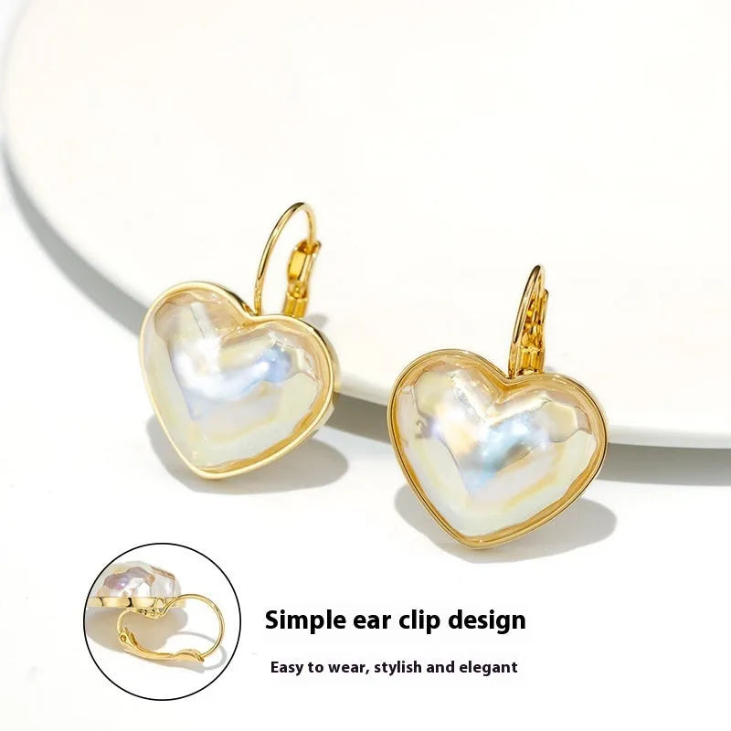 Gold colour alloy ear clips with metal elements and natural style for women