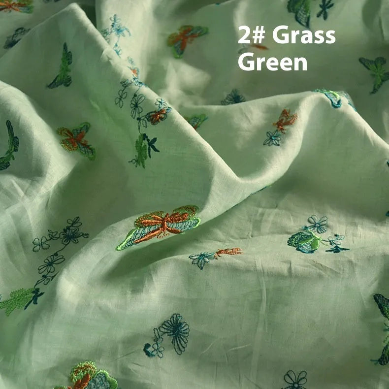 Pure ramie embroidery cloth Hanfu fabric in beige, grass green and dark green colours showing texture