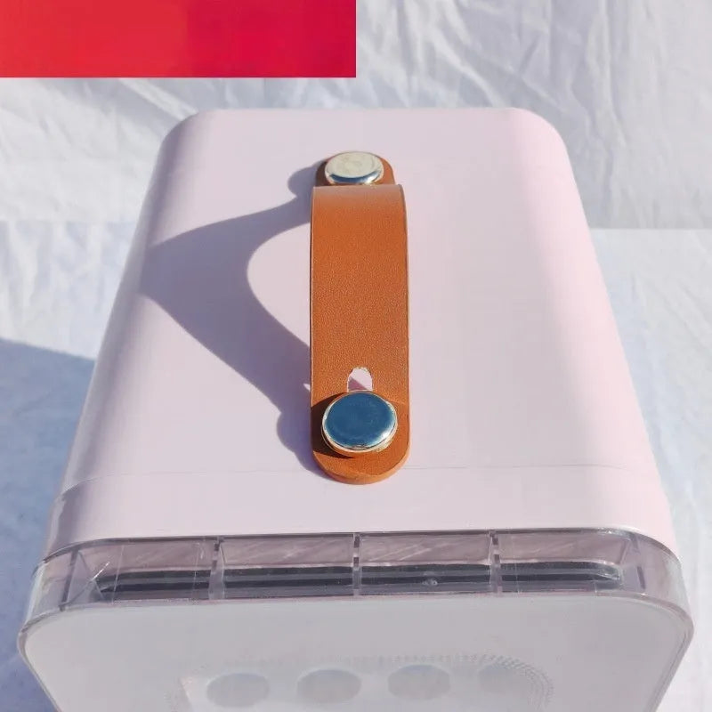 Pink mini refrigerator with transparent door showing interior storage for cosmetics