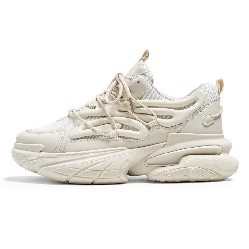 Men's beige and black low-top lace-up sneakers with mesh upper and rubber platform sole.