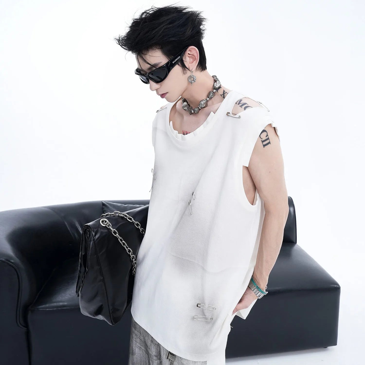 Men's black sleeveless waistcoat vest with ripped irregular cutting details and round neck collar