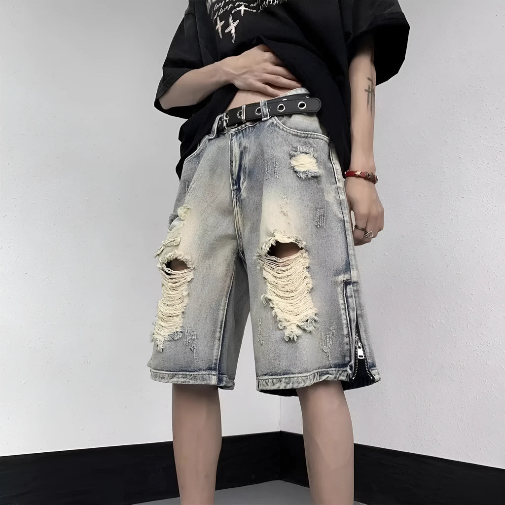Blue retro denim shorts with a wide-leg loose fit and tattered distressing on the legs.