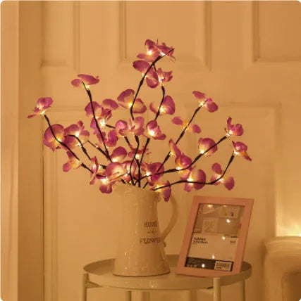 65cm long pink LED phalaenopsis branch decorative light on a dark background
