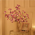 65cm long pink LED phalaenopsis branch decorative light on a dark background