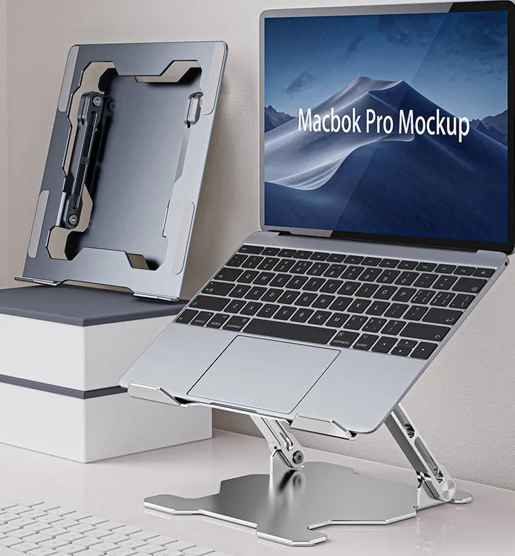Grey adjustable aluminium laptop stand with hollow design, shown holding a silver laptop.