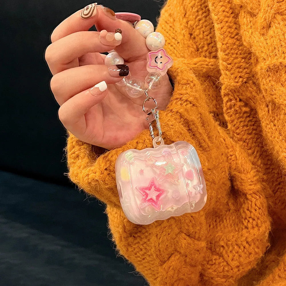 Pink transparent silicone AirPods case with gradual change star pattern and star hand rope