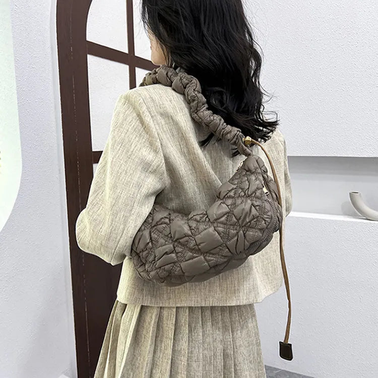 Women's nylon messenger bag in a solid colour with adjustable shoulder strap showing 35cm width.