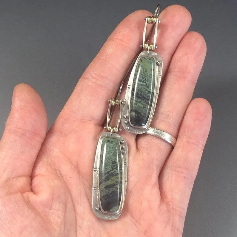 Two-tone geometric marble pattern alloy earrings with simple modern design