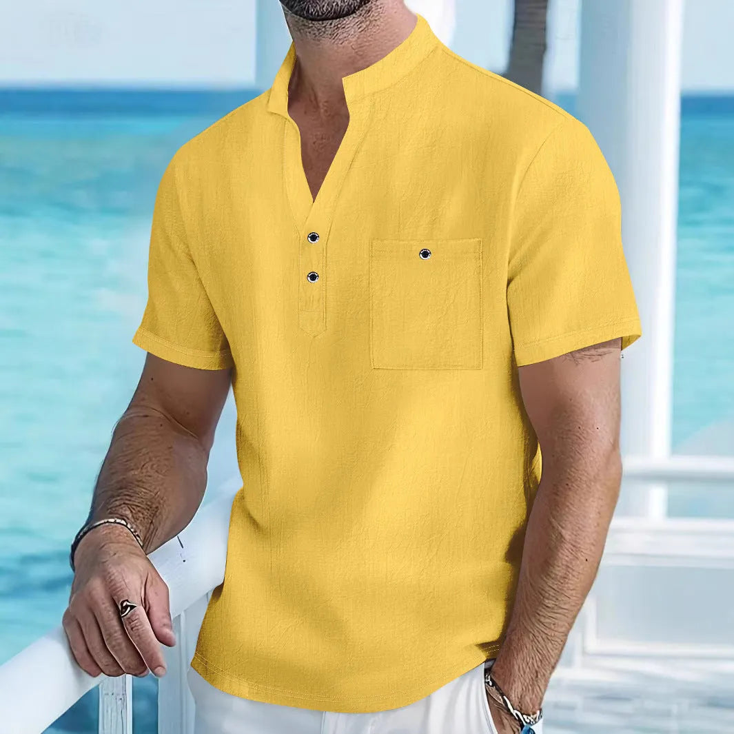 Men's light blue linen stand collar short sleeve shirt laid flat showing loose fit