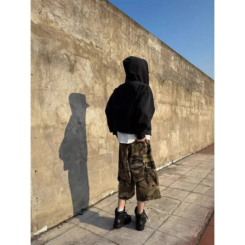 Men's camouflage cropped jeans with retro patches and ripped distressing in straight-leg cut