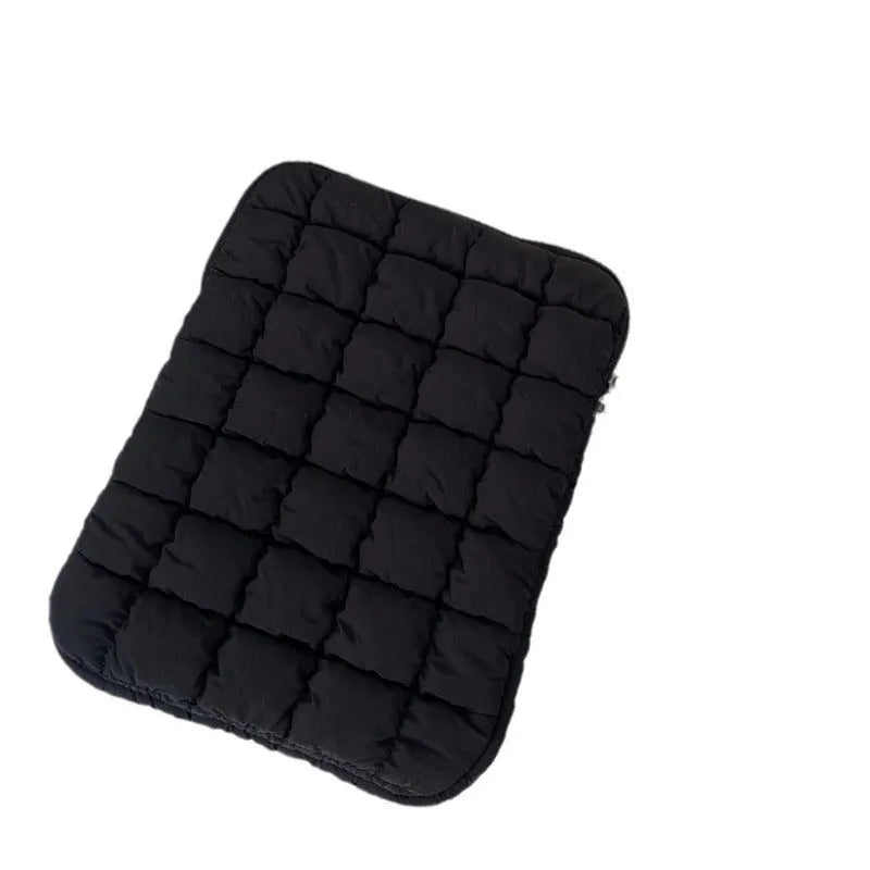 Black nylon laptop shoulder bag showing large capacity and shoulder strap