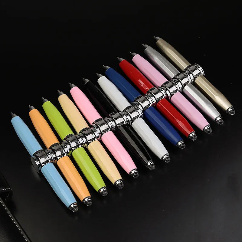 Metal ballpoint pen with spinning decompression gyro mechanism showing 12 ink colour options