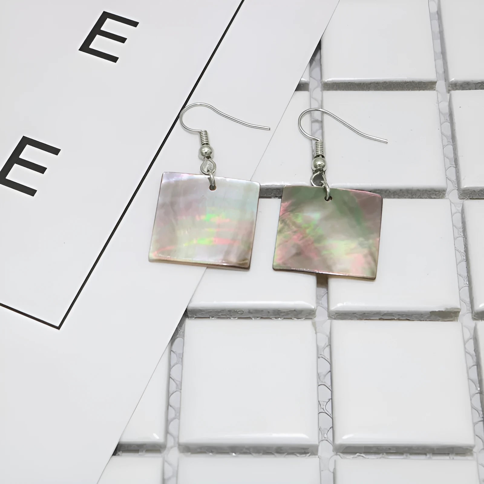 Shell earrings with geometric square panther and rectangular shell designs