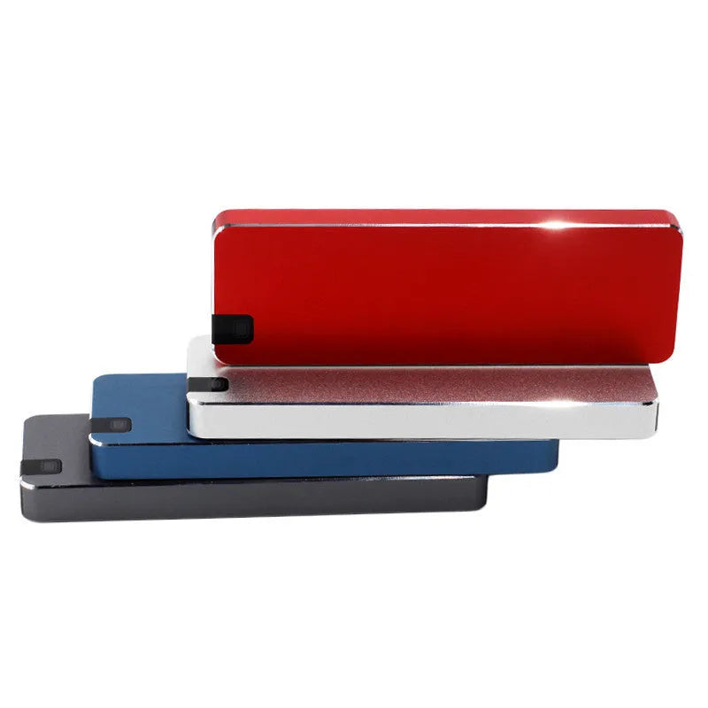 White portable SSD hard drive with metal casing measuring 0.6cm × 3.2cm × 1cm with USB 3.1 cable