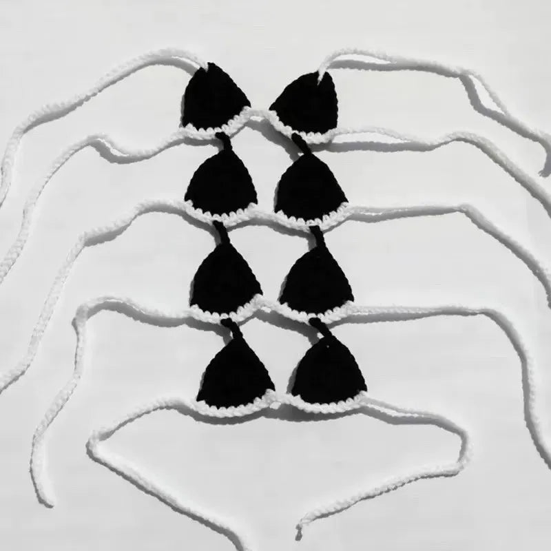 Cat wearing bikini costume in various colours for Halloween or party events