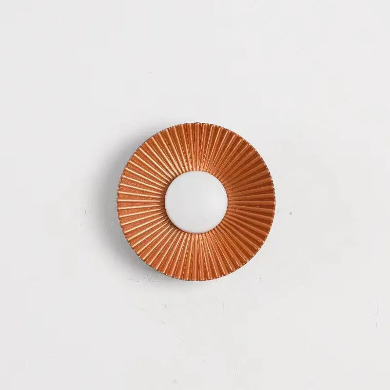 Round aluminium wall lamp with LED lighting in white and gold colour combination for bedroom or living room
