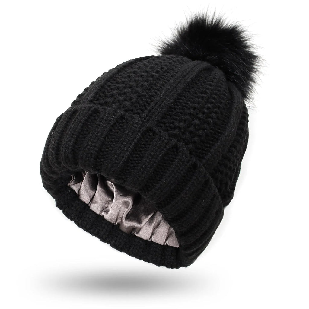 Wool beanie hat with satin lining and faux fur pom pom in wine red colour