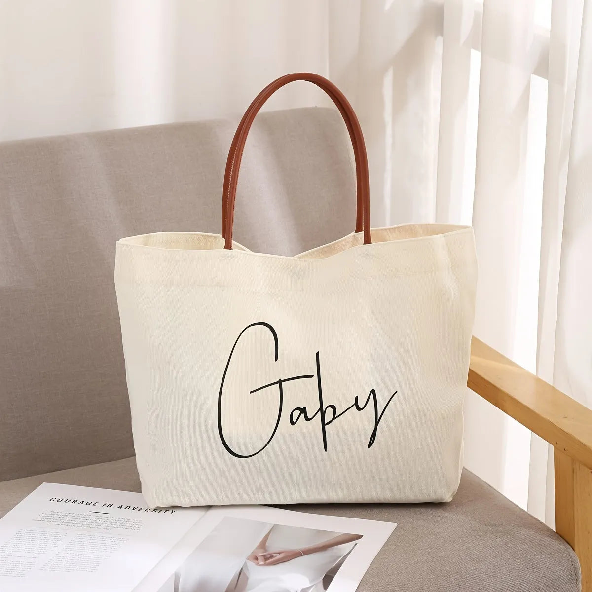 Natural cotton canvas tote bag with zip closure and double shoulder straps in beige white colour
