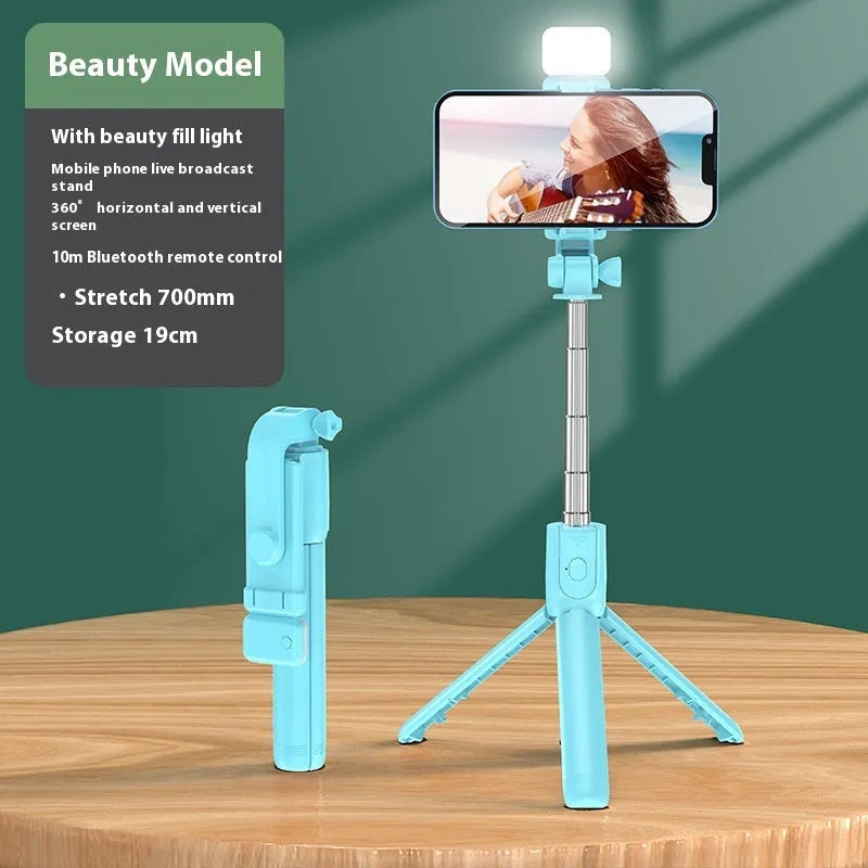 Bluetooth selfie stick tripod with LED light extended to 70cm on surface, four colour options
