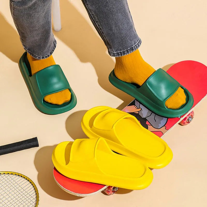 A pair of thick-soled EVA foam flip-flop slippers in a choice of seven colours on a plain background.