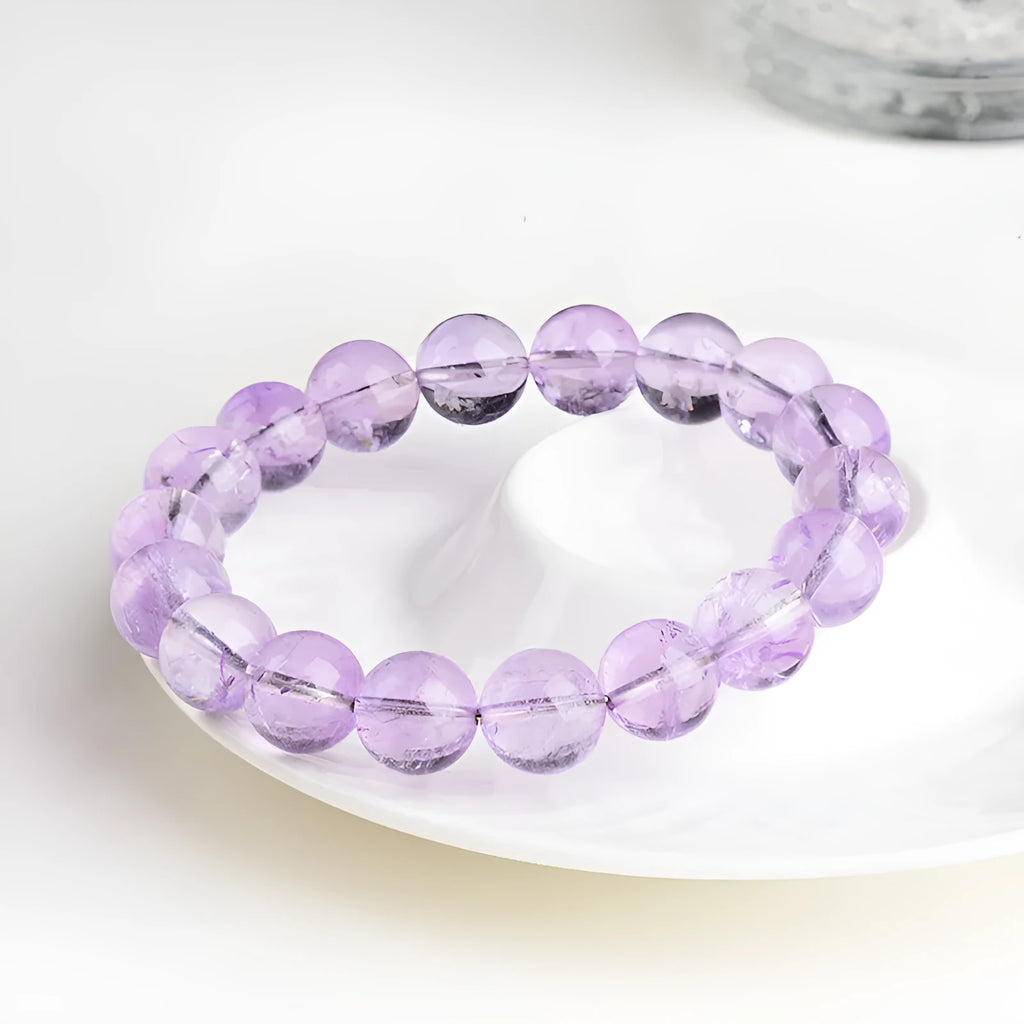 Lavender amethyst bracelet with water ripple design on round beads in two colour options.