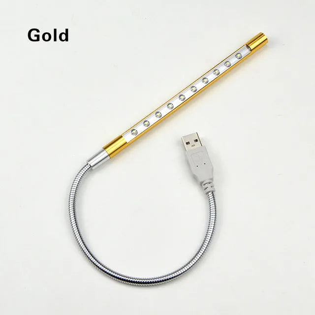 Spiral-shaped aluminium USB desk lamp in metallic colour, showing its 420mm height and push-button switch.