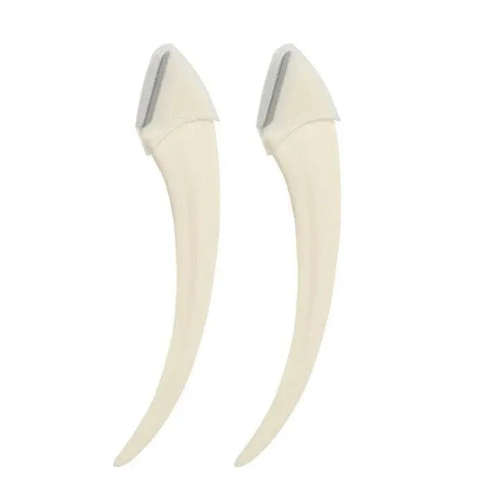 White and pink curved moon-shaped eyebrow trimming knife with a comb on a white background.