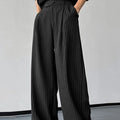 Black men's casual trousers with vertical stripes and pleated detailing
