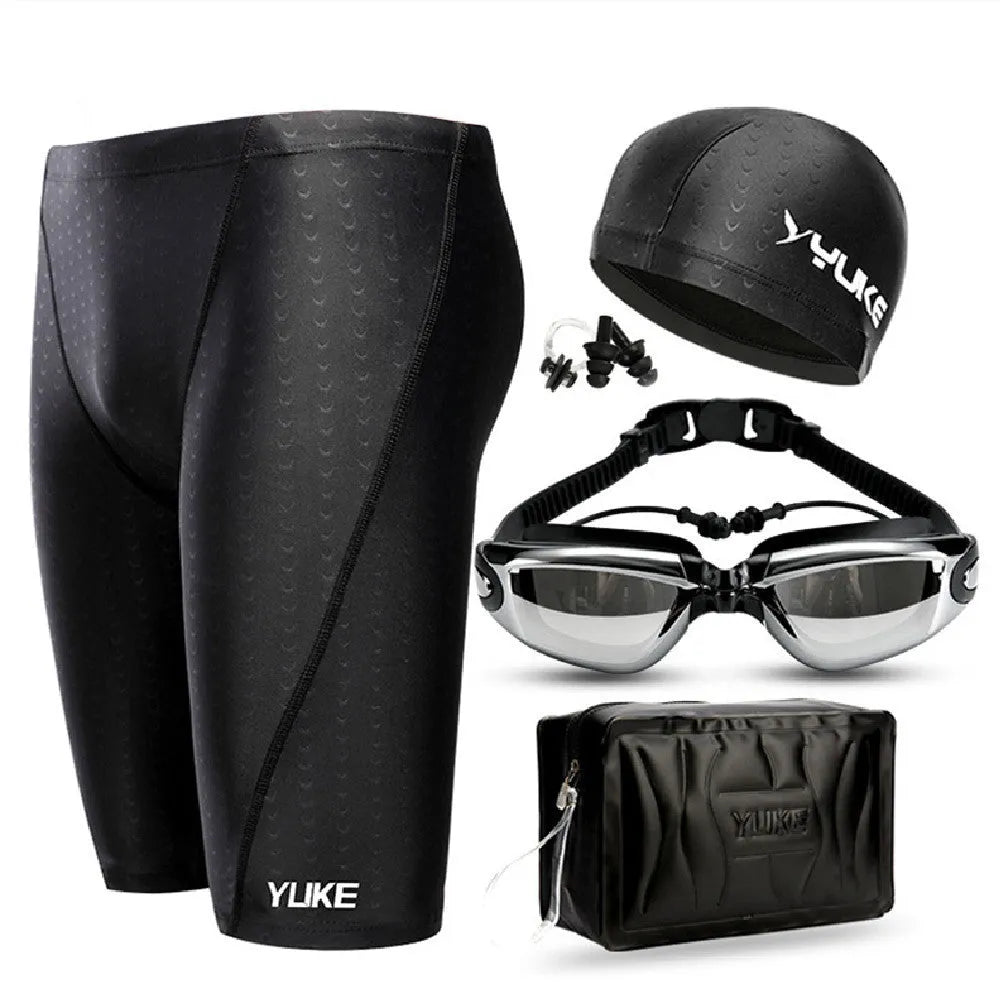 Men's black polyester swimming set with trunks, anti-fog goggles, waterproof cap, ear plugs, nose clip, and carry bag