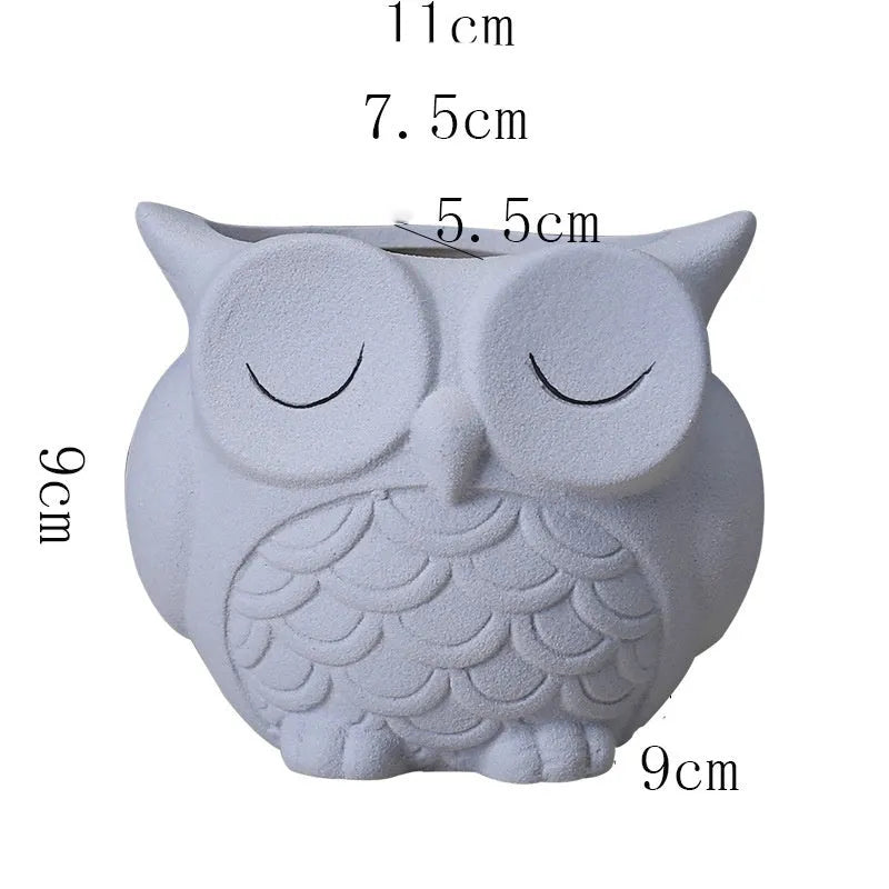 Handmade frosted ceramic owl flower pot in light pink for small succulents.