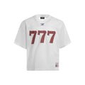 Loose retro-style T-shirt in black, shown on a hanger.