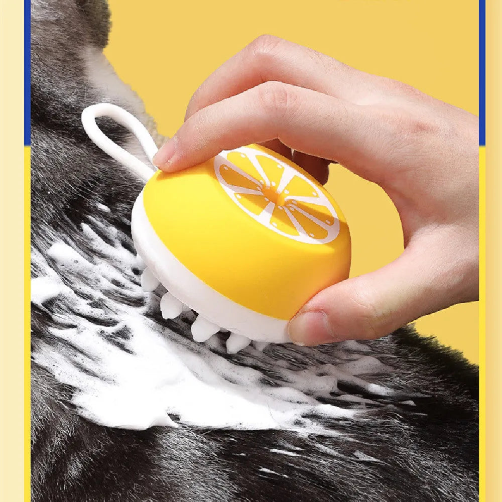 Yellow silicone pet bath brush with massage head design on wooden surface